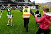 9 April 2023; Young supporters are seperated from Diarmaid Byrnes of Limerick by a steward after the Allianz Hurling League Final match between Kilkenny and Limerick at Páirc Ui Chaoimh in Cork. Photo by Eóin Noonan/Sportsfile