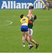 9 April 2023; Aidan O'Shea of Mayo and Keith Doyle of Roscommon compete for the throw-in during the Connacht GAA Football Senior Championship Quarter-Final match between Mayo and Roscommon at Hastings Insurance MacHale Park in Castlebar, Mayo. Photo by Ramsey Cardy/Sportsfile