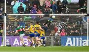 9 April 2023; Roscommon goalkeeper Conor Carroll saves a shot at goal by Stephen Coen of Mayo during the Connacht GAA Football Senior Championship Quarter-Final match between Mayo and Roscommon at Hastings Insurance MacHale Park in Castlebar, Mayo. Photo by Ramsey Cardy/Sportsfile