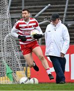 9 April 2023; Umpire Paul Kelly watches Cork goalkeeper Míchéal Aodh Martin as he makes his way to take a quick kick-out during the Munster GAA Football Senior Championship Quarter-Final match between Clare and Cork at Cusack Park in Ennis, Clare. Photo by Piaras Ó Mídheach/Sportsfile