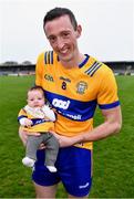 9 April 2023; Cathal O'Connor of Clare holds his daughter Saidbh, age ten weeks, after his side's victory in the Munster GAA Football Senior Championship Quarter-Final match between Clare and Cork at Cusack Park in Ennis, Clare. Photo by Piaras Ó Mídheach/Sportsfile