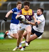 9 April 2023; Ben Brosnan of Wexford wins a penalty after being fouled by Scott Osborne of Laois during the Leinster GAA Football Senior Championship Round 1 match between Laois and Wexford at Laois Hire O'Moore Park in Portlaoise, Laois. Photo by Tom Beary/Sportsfile