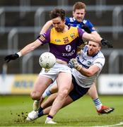 9 April 2023; Ben Brosnan of Wexford wins a penalty after being fouled by Scott Osborne of Laois during the Leinster GAA Football Senior Championship Round 1 match between Laois and Wexford at Laois Hire O'Moore Park in Portlaoise, Laois. Photo by Tom Beary/Sportsfile