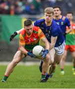 9 April 2023; Mikey Bambrick of Carlow in action against Kevin Quinn of Wicklow during the Leinster GAA Football Senior Championship Round 1 match between Wicklow and Carlow at Echelon Park in Aughrim, Wicklow. Photo by Daire Brennan/Sportsfile