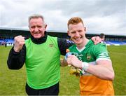 9 April 2023; Offaly manager Martin Murphy and Ciaran Donnelly celebrate the Leinster GAA Football Senior Championship Round 1 match between Longford and Offaly at Glennon Brothers Pearse Park in Longford. Photo by Ray McManus/Sportsfile