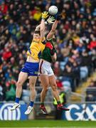 9 April 2023; Aidan O'Shea of Mayo in action against Keith Doyle of Roscommon during the Connacht GAA Football Senior Championship Quarter-Final match between Mayo and Roscommon at Hastings Insurance MacHale Park in Castlebar, Mayo. Photo by Ramsey Cardy/Sportsfile