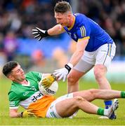 9 April 2023; Ruairi McNamee of Offaly is tackled by Michael Quinn of Longford during the Leinster GAA Football Senior Championship Round 1 match between Longford and Offaly at Glennon Brothers Pearse Park in Longford. Photo by Ray McManus/Sportsfile