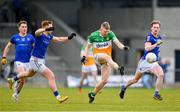 9 April 2023; David Dempsey of Offaly in action against Longford players, Ryan Moffett, left, and Tadhg McNevin, during the Leinster GAA Football Senior Championship Round 1 match between Longford and Offaly at Glennon Brothers Pearse Park in Longford. Photo by Ray McManus/Sportsfile