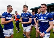 9 April 2023; Laois players, from left, Robert Pigott, Damon Larkin and Kevin Swayne following the Leinster GAA Football Senior Championship Round 1 match between Laois and Wexford at Laois Hire O'Moore Park in Portlaoise, Laois. Photo by Tom Beary/Sportsfile