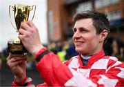 9 April 2023; Jockey Sean O'Keeffe with the cup after winning the WilllowWarm Gold Cup on day two of the Fairyhouse Easter Festival at Fairyhouse Racecourse in Ratoath, Meath. Photo by Harry Murphy/Sportsfile