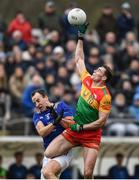 9 April 2023; Jordan Morrissey of Carlow in action against Paul McLoughlin of Wicklow during the Leinster GAA Football Senior Championship Round 1 match between Wicklow and Carlow at Echelon Park in Aughrim, Wicklow. Photo by Daire Brennan/Sportsfile
