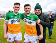 9 April 2023; Jamie Evans and Ruairi McNamee of Offaly and Ruairi's dad Michael, right, after the Leinster GAA Football Senior Championship Round 1 match between Longford and Offaly at Glennon Brothers Pearse Park in Longford. Photo by Ray McManus/Sportsfile
