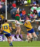 9 April 2023; Matthew Ruane of Mayo in action against Keith Doyle of Roscommon during the Connacht GAA Football Senior Championship Quarter-Final match between Mayo and Roscommon at Hastings Insurance MacHale Park in Castlebar, Mayo. Photo by Ramsey Cardy/Sportsfile