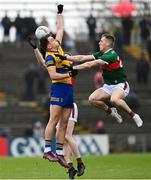 9 April 2023; Enda Smith of Roscommon in action against Eoghan McLaughlin of Mayo during the Connacht GAA Football Senior Championship Quarter-Final match between Mayo and Roscommon at Hastings Insurance MacHale Park in Castlebar, Mayo. Photo by Ramsey Cardy/Sportsfile