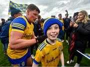 9 April 2023; Conor Cox of Roscommon signs his autograph on the shirt of a young supporter after the Connacht GAA Football Senior Championship Quarter-Final match between Mayo and Roscommon at Hastings Insurance MacHale Park in Castlebar, Mayo. Photo by Ray Ryan/Sportsfile