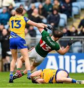 9 April 2023; Aidan O'Shea of Mayo is pushed by Conor Cox of Roscommon during the Connacht GAA Football Senior Championship Quarter-Final match between Mayo and Roscommon at Hastings Insurance MacHale Park in Castlebar, Mayo. Photo by Ramsey Cardy/Sportsfile