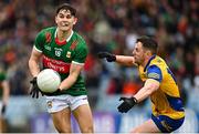 9 April 2023; Tommy Conroy of Mayo in action against Ciaráin Murtagh of Roscommon during the Connacht GAA Football Senior Championship Quarter-Final match between Mayo and Roscommon at Hastings Insurance MacHale Park in Castlebar, Mayo. Photo by Ramsey Cardy/Sportsfile