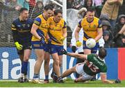 9 April 2023; Aidan O'Shea of Mayo with Roscommon players, from left, Conor Carroll, Conor Hussey, Conor Daly, David Murray and Niall Daly during the Connacht GAA Football Senior Championship Quarter-Final match between Mayo and Roscommon at Hastings Insurance MacHale Park in Castlebar, Mayo. Photo by Ramsey Cardy/Sportsfile