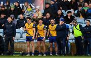 9 April 2023; Roscommon manager Davy Burke, right, watches on with players, from left, Dylan Ruane, Diarmuid Murtagh and Donie Smith during the Connacht GAA Football Senior Championship Quarter-Final match between Mayo and Roscommon at Hastings Insurance MacHale Park in Castlebar, Mayo. Photo by Ramsey Cardy/Sportsfile