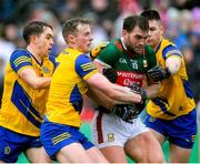 9 April 2023; Aidan O'Shea of Mayo in action against Eoin McCormack, David Murray and Conor Daly of Roscommon during the Connacht GAA Football Senior Championship Quarter-Final match between Mayo and Roscommon at Hastings Insurance MacHale Park in Castlebar, Mayo. Photo by Ray Ryan/Sportsfile