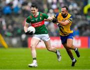 9 April 2023; Paddy Durcan of Mayo in action agaisnt Donie Smith of Roscommon during the Connacht GAA Football Senior Championship Quarter-Final match between Mayo and Roscommon at Hastings Insurance MacHale Park in Castlebar, Mayo. Photo by Ray Ryan/Sportsfile