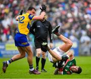 9 April 2023; Jordan Flynn of Mayo, tumbles, while in action against Enda Smith of Roscommon during the Connacht GAA Football Senior Championship Quarter-Final match between Mayo and Roscommon at Hastings Insurance MacHale Park in Castlebar, Mayo. Photo by Ray Ryan/Sportsfile