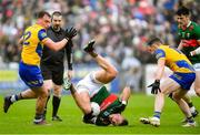9 April 2023; Jordan Flynn of Mayo, tumbles, while in action against Enda Smith of Roscommon during the Connacht GAA Football Senior Championship Quarter-Final match between Mayo and Roscommon at Hastings Insurance MacHale Park in Castlebar, Mayo. Photo by Ray Ryan/Sportsfile