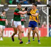 9 April 2023; Aidan O'Shea of Mayo and Dylan Ruane of Roscommon get to grips with each other during the Connacht GAA Football Senior Championship Quarter-Final match between Mayo and Roscommon at Hastings Insurance MacHale Park in Castlebar, Mayo. Photo by Ray Ryan/Sportsfile