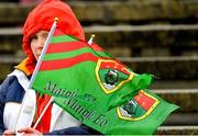 9 April 2023; A woman holds onto Mayo flags during the Connacht GAA Football Senior Championship Quarter-Final match between Mayo and Roscommon at Hastings Insurance MacHale Park in Castlebar, Mayo. Photo by Ray Ryan/Sportsfile