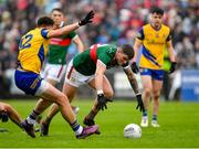 9 April 2023; Jordan Flynn of Mayo in action against Enda Smith of Roscommon during the Connacht GAA Football Senior Championship Quarter-Final match between Mayo and Roscommon at Hastings Insurance MacHale Park in Castlebar, Mayo. Photo by Ray Ryan/Sportsfile