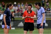 9 April 2023; Referee Maggie Farrelly performs the coin toss in the company of captains Aimee Mackin of Armagh and 2022 Allstars, left, and Hannah Tyrrell of Dublin and 2021 Allstars before the TG4 LGFA All-Star exhibition match between the 2021 Allstars and the 2022 Allstars at St Edward's University in Austin, Texas, USA. Photo by Brendan Moran/Sportsfile