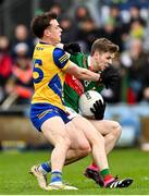 9 April 2023; Conor McStay  of Mayo in action against Ben O'Carroll of Roscommon during the Connacht GAA Football Senior Championship Quarter-Final match between Mayo and Roscommon at Hastings Insurance MacHale Park in Castlebar, Mayo. Photo by Ramsey Cardy/Sportsfile