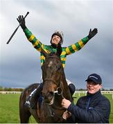 10 April 2023; Jockey Paul Townend celebrates on I Am Maximus with groom Steven Cahill after winning the BoyleSports Irish Grand National Steeplechase during day three of the Fairyhouse Easter Festival at Fairyhouse Racecourse in Ratoath, Meath. Photo by Seb Daly/Sportsfile