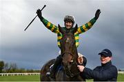 10 April 2023; Jockey Paul Townend celebrates on I Am Maximus with groom Steven Cahill after winning the BoyleSports Irish Grand National Steeplechase during day three of the Fairyhouse Easter Festival at Fairyhouse Racecourse in Ratoath, Meath. Photo by Seb Daly/Sportsfile