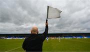 9 April 2023; A linesman hold his flag aloft as a substitution is made during the Leinster GAA Football Senior Championship Round 1 match between Longford and Offaly at Glennon Brothers Pearse Park in Longford. Photo by Ray McManus/Sportsfile