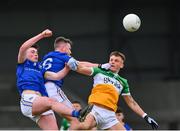 9 April 2023; Jack McEvoy of Offaly in action against Michael Quinn and Jack Macken of Longford, left, during the Leinster GAA Football Senior Championship Round 1 match between Longford and Offaly at Glennon Brothers Pearse Park in Longford. Photo by Ray McManus/Sportsfile