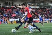 10 April 2023; Ollie O'Neill of Derry City in action against Keith Buckley of Bohemians during the SSE Airtricity Men's Premier Division match between Derry City and Bohemians at The Ryan McBride Brandywell Stadium in Derry. Photo by Ramsey Cardy/Sportsfile