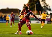 10 April 2023; Elicha Ahui of Drogheda United in action against Thomas Lonergan of St Patrick's Athletic during the SSE Airtricity Men's Premier Division match between Drogheda United and St Patrick's Athletic at Weaver's Park in Drogheda, Louth. Photo by Ben McShane/Sportsfile