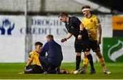 10 April 2023; Joe Redmond of St Patrick's Athletic is treated for an injury by St Patrick's Athletic head of medical Sam Rice during the SSE Airtricity Men's Premier Division match between Drogheda United and St Patrick's Athletic at Weaver's Park in Drogheda, Louth. Photo by Ben McShane/Sportsfile