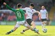 10 April 2023; Ryan O'Kane of Dundalk in action against Barry Coffey of Cork City during the SSE Airtricity Men's Premier Division match between Cork City and Dundalk at Turner's Cross in Cork. Photo by Eóin Noonan/Sportsfile