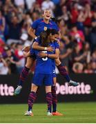11 April 2023; Alana Cook of United States celebrates with teammate Kelley O'Hara, 5, and Sophia Smith, top, after scoring their side's first goal during the women's international friendly match between USA and Republic of Ireland at CITYPARK in St Louis, Missouri, USA. Photo by Stephen McCarthy/Sportsfile