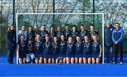 13 April 2023; The UCD team including, captain Hannah McLoughlin, Sophia Cole, Leah O'Shea, Sarah McAuley, Katherine Egan, Lucy Crowe, Caoimh Byrne, Grace Keane, Eva Lavelle, Katie Jane Marshall, Ali Griffin, Michelle Carey, Charlotte Cope, Aine Naughton, Niamh Carey, Norah McGinty, Ellie McLoughlin, Kate Ryan, Caro Theunisz   and Lisa McLoughlin pose for a photo with the trophy alongside, Barbara O'Malley, Vice President of Hockey Ireland, left, manager Marty Burke, right, and coach, Miles Warren, second from right, during the UCD Ladies Hockey EYHL medal presentation event at UCD Hockey Stadium in Belfield, Dublin. Photo by Tyler Miller/Sportsfile