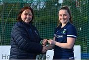13 April 2023; Lucy Crowe is presented with her winners medal by Vice President of Hockey Ireland Barbara O'Malley during the UCD Ladies Hockey EYHL medal presentation event at UCD Hockey Stadium in Belfield, Dublin. Photo by Tyler Miller/Sportsfile
