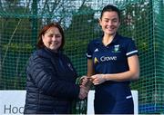 13 April 2023; Katherine Egan is presented with her winners medal by Vice President of Hockey Ireland Barbara O'Malley during the UCD Ladies Hockey EYHL medal presentation event at UCD Hockey Stadium in Belfield, Dublin. Photo by Tyler Miller/Sportsfile