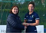 13 April 2023; Caoimh Byrne is presented with her winners medal by Vice President of Hockey Ireland Barbara O'Malley during the UCD Ladies Hockey EYHL medal presentation event at UCD Hockey Stadium in Belfield, Dublin. Photo by Tyler Miller/Sportsfile
