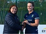 13 April 2023; Grace Keane is presented with her winners medal by Vice President of Hockey Ireland Barbara O'Malley during the UCD Ladies Hockey EYHL medal presentation event at UCD Hockey Stadium in Belfield, Dublin. Photo by Tyler Miller/Sportsfile