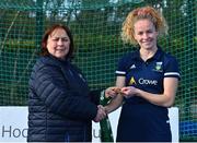 13 April 2023; Michelle Carey is presented with her winners medal by Vice President of Hockey Ireland Barbara O'Malley during the UCD Ladies Hockey EYHL medal presentation event at UCD Hockey Stadium in Belfield, Dublin. Photo by Tyler Miller/Sportsfile