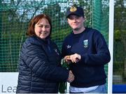 13 April 2023; Ellie McLoughlin is presented with her winners medal by Vice President of Hockey Ireland Barbara O'Malley during the UCD Ladies Hockey EYHL medal presentation event at UCD Hockey Stadium in Belfield, Dublin. Photo by Tyler Miller/Sportsfile