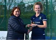 13 April 2023; Niamh Carey is presented with her winners medal by Vice President of Hockey Ireland Barbara O'Malley during the UCD Ladies Hockey EYHL medal presentation event at UCD Hockey Stadium in Belfield, Dublin. Photo by Tyler Miller/Sportsfile