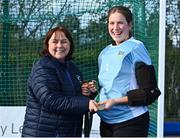 13 April 2023; Nora McGinty is presented with her winners medal by Vice President of Hockey Ireland Barbara O'Malley during the UCD Ladies Hockey EYHL medal presentation event at UCD Hockey Stadium in Belfield, Dublin. Photo by Tyler Miller/Sportsfile